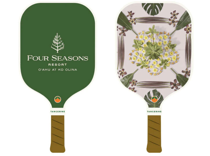 Custom pickleball paddle with the text