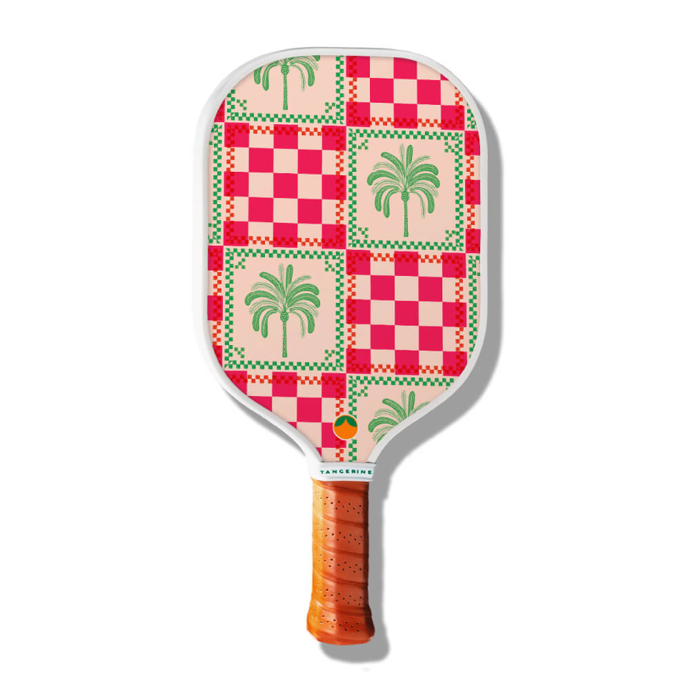 Checkered and palm tree-inspired pickleball paddle design 