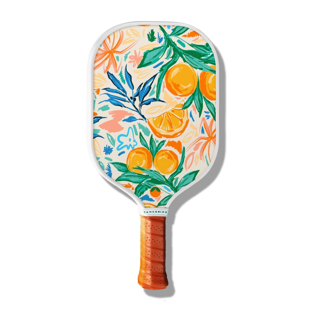 Tangerine Kauai pickleball paddle with tropical design. 