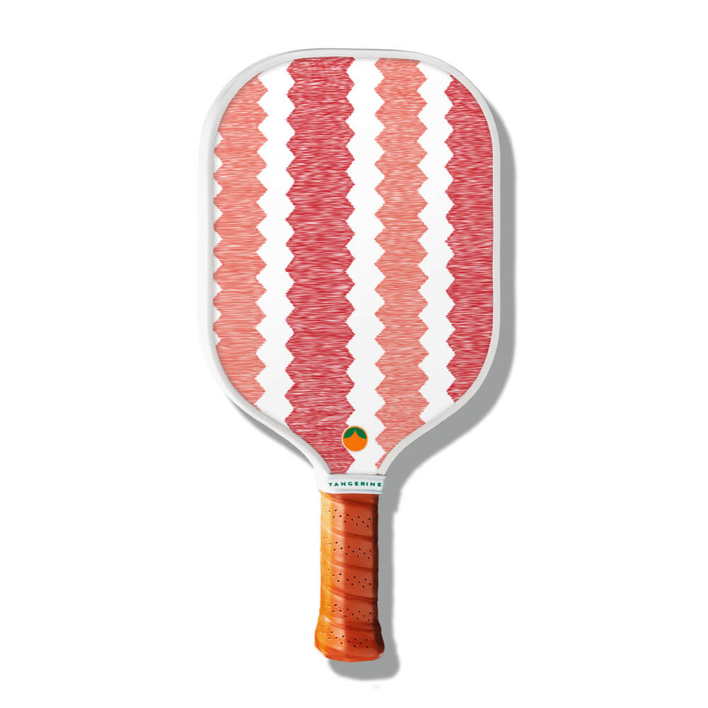 Pink and white zigzag striped pickleball paddle 