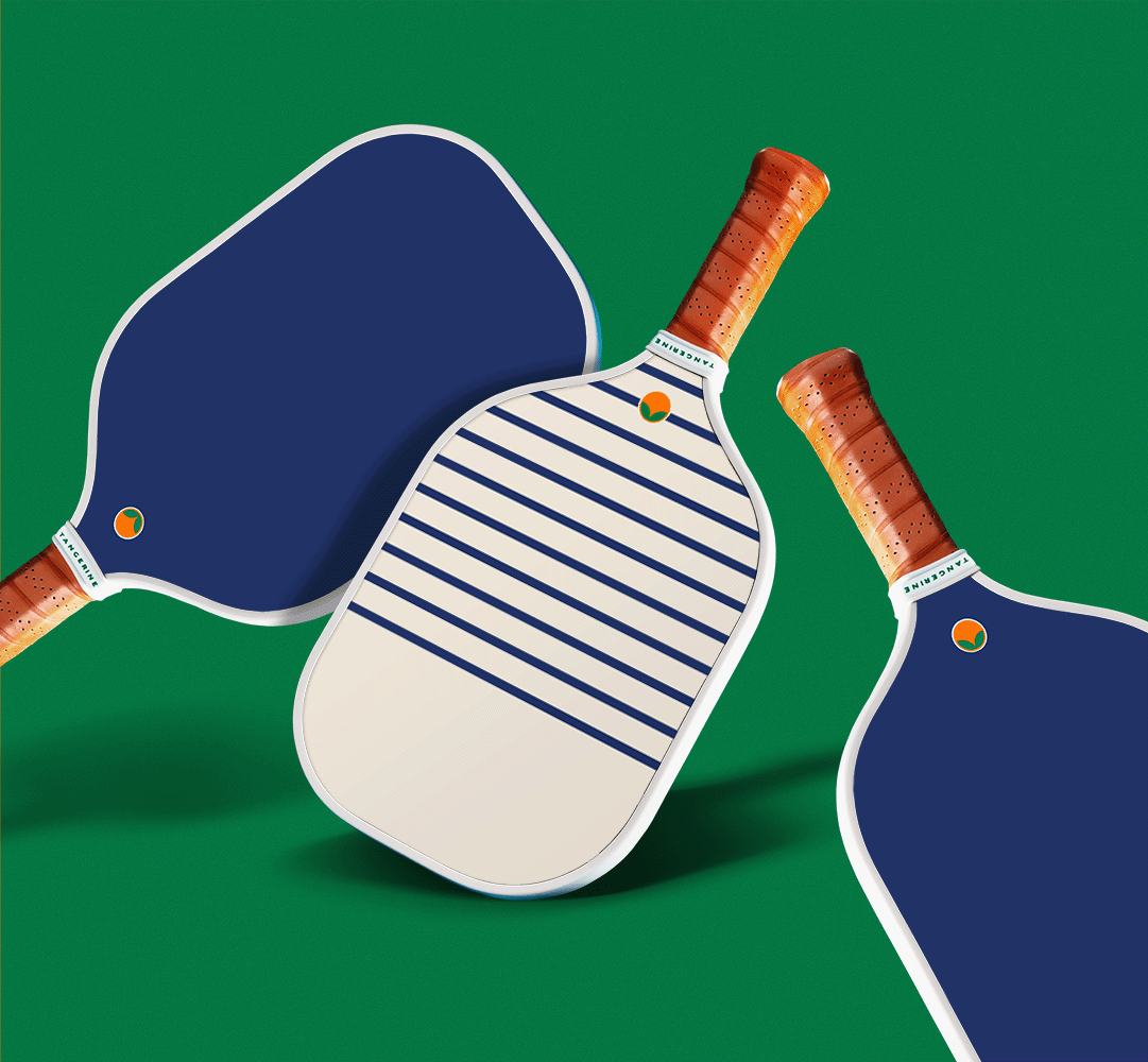Nautical pickleball paddle with blue backing. 